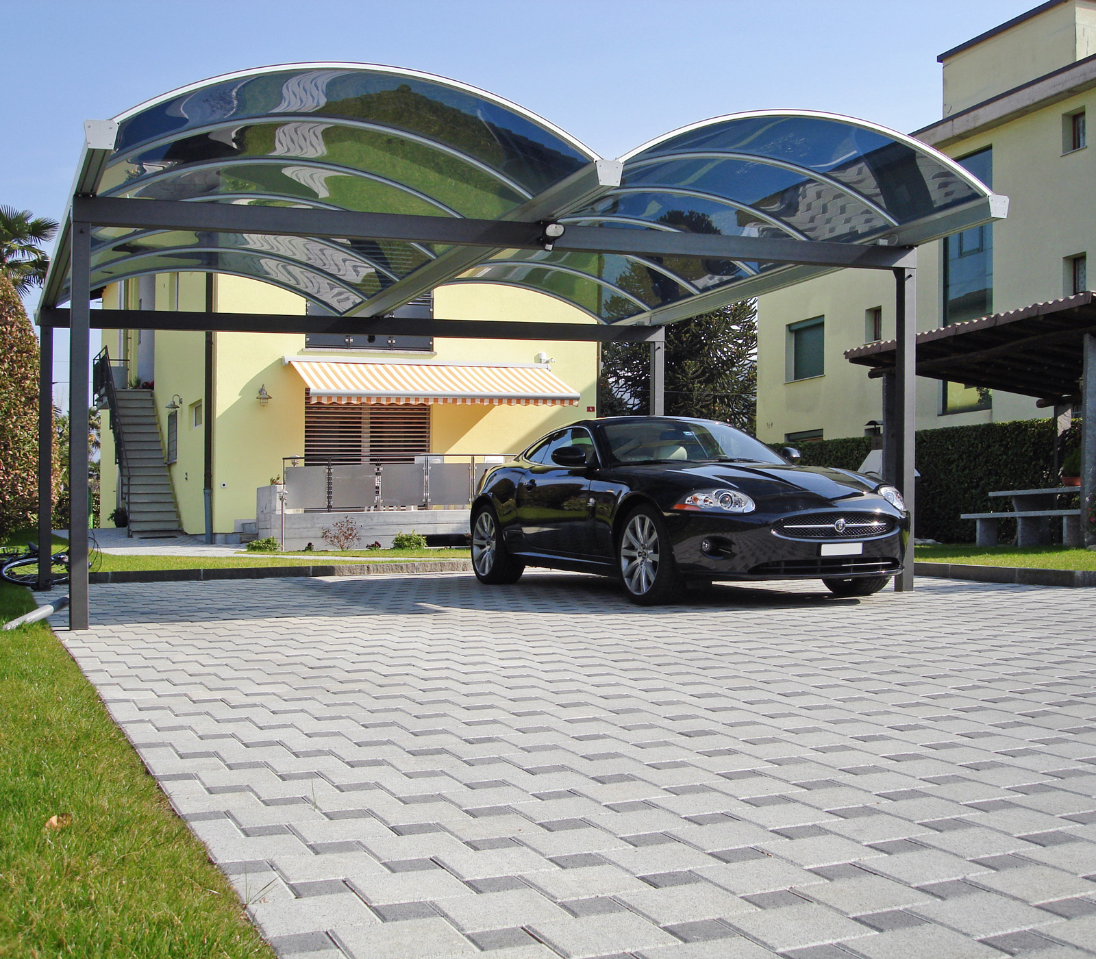 Carport Arco mit Tonnendach aus Plexiglas Röhm freistehend